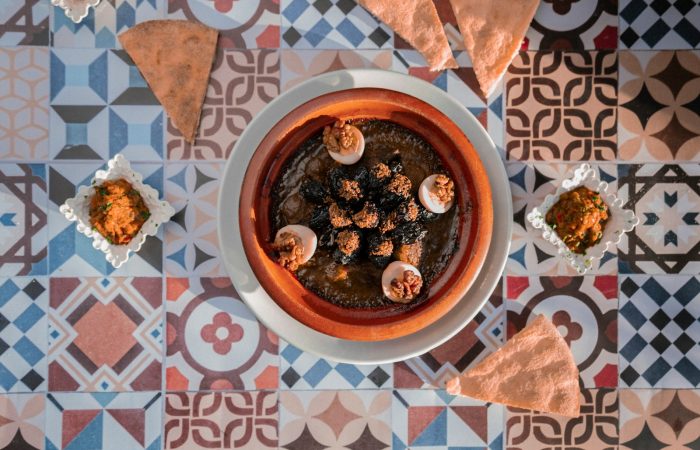 a bowl of food sitting on top of a table
